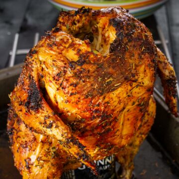 Oven roasted chicken on a can of beer