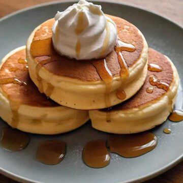 3 japanese pancakes on a plate.