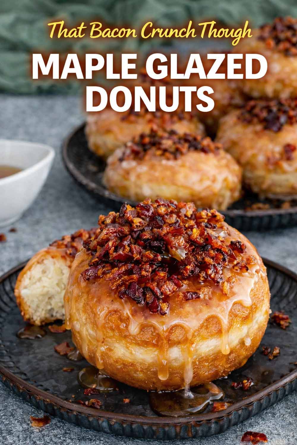 Vertical Pinterest pin showing glazed donuts with bacon bits and bold text overlay saying Maple Glazed Donuts Bacon Crunch.