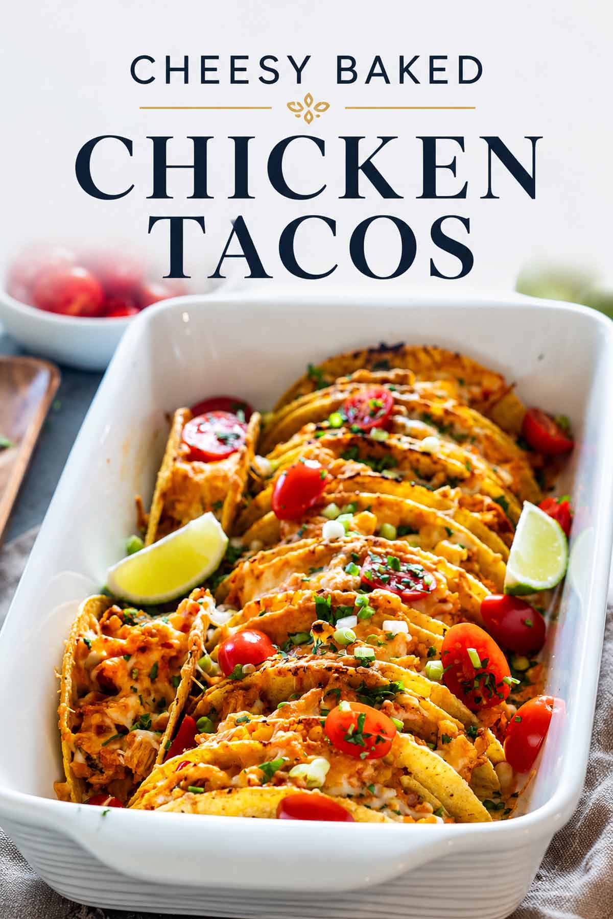 Pinterest graphic featuring cheesy baked chicken tacos in a baking dish with fresh garnishes and elegant text overlay.
