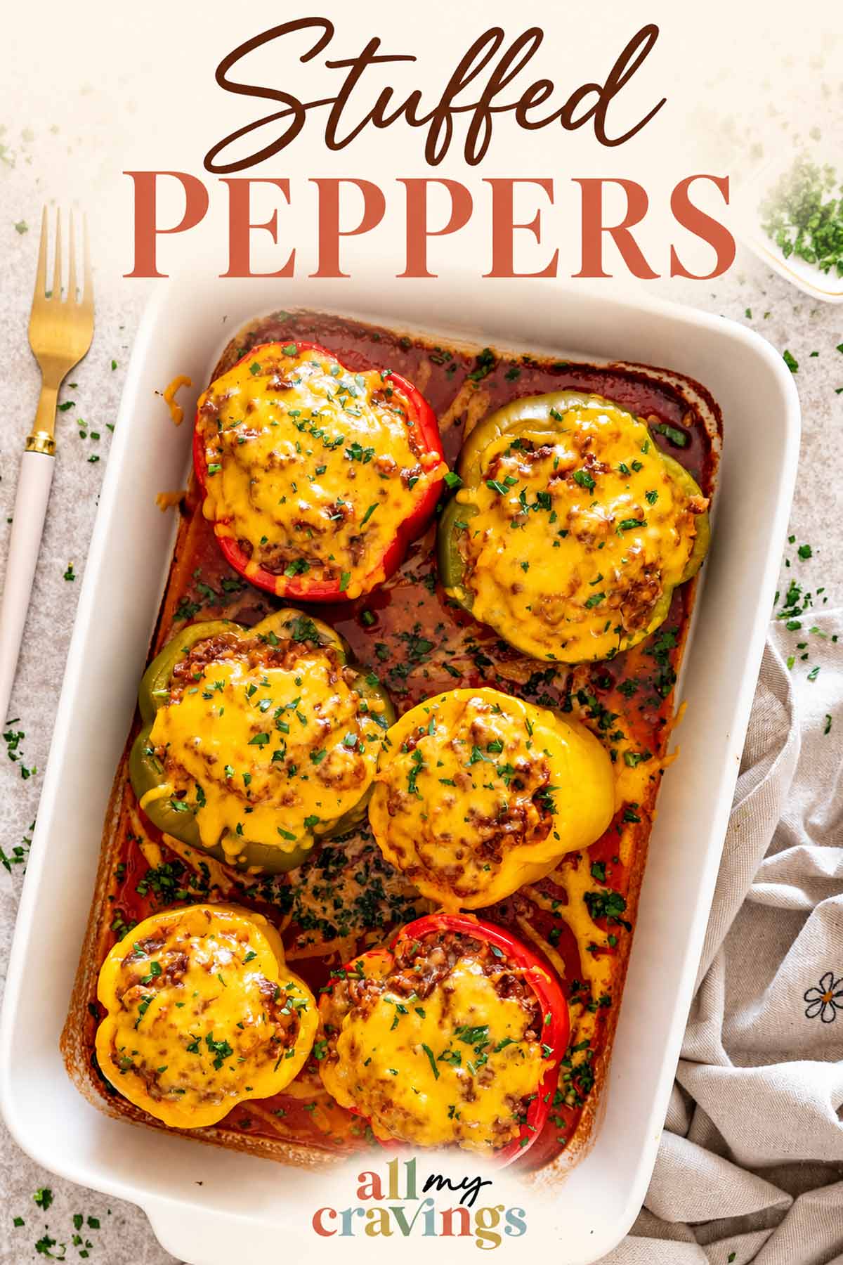 Pinterest graphic featuring six cheesy stuffed peppers baked in tomato sauce with the Stuffed Peppers recipe title.